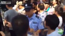 Chinese Police, Christians Clash Over Cross Demolition