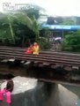 Little Childeren Playing on Train Tracks As Trains Comes Closer