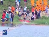 VIDEO- A Shaolin monk runs 125 meters above the water