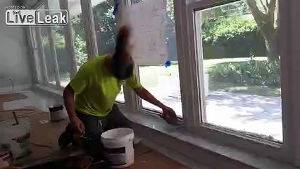 Fun guy spins his head like a metal rock star while doing construction