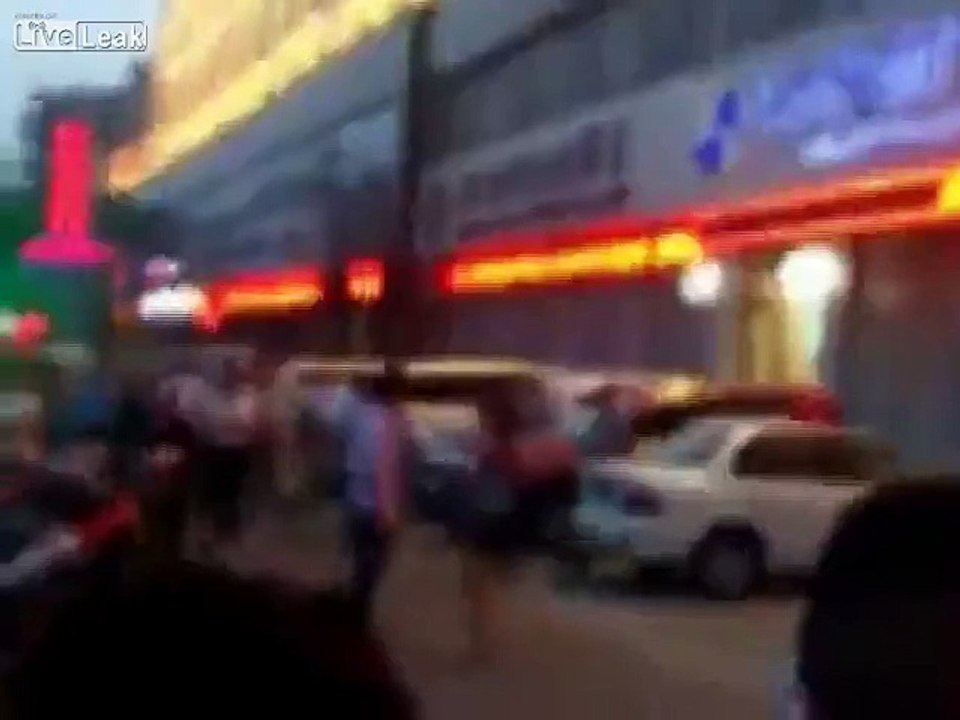 People watch woman slapping man in face on street
