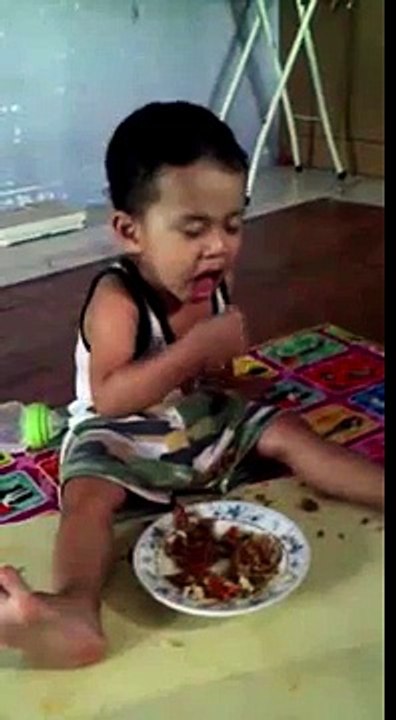 Funny cute chinese baby eating and sleeping