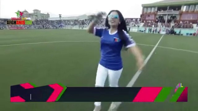 Female singer performs at Afghan football premier league (young crowd bursts in excitement)