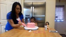 Alanah decorating her cake