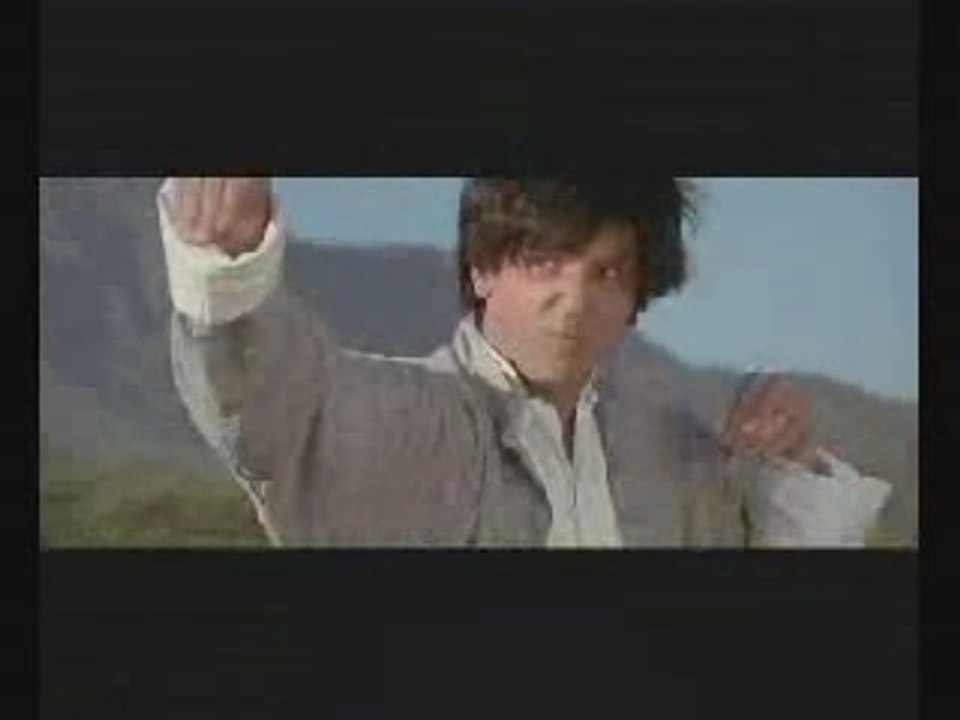 Grosse baston Jet Li avec une vache