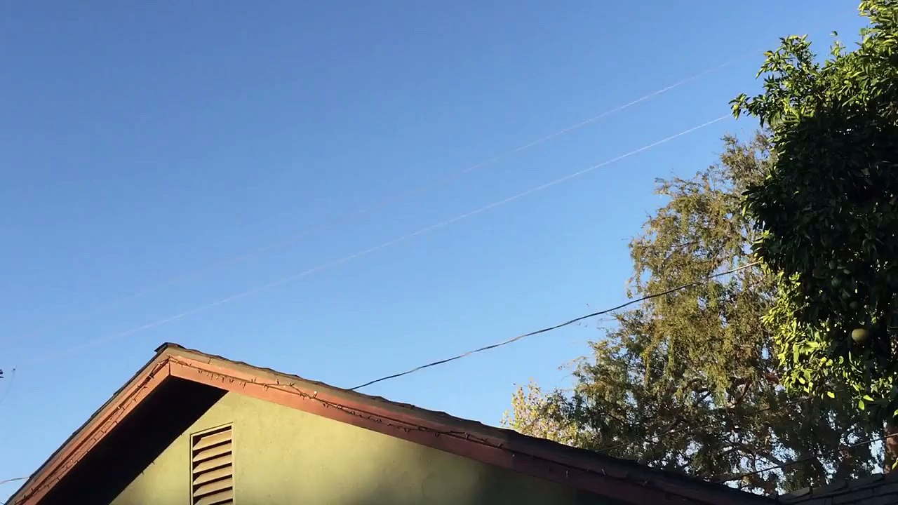 WWII fighter flying over the house.