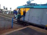 People hanging onto overloaded train in South Africa