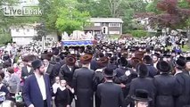 Hasidic Orthodox Jewish Men Dance With Torah