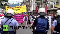 Switzerland: Police fire rubber bullets at pro-refugee protesters
