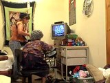 a boy and his granny....playing rockband.....