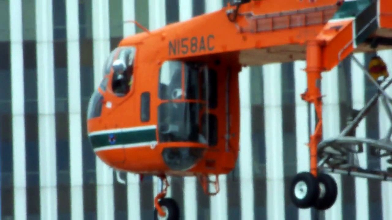 Sikorsky S-64F Skycrane lifting cooling tower in Tulsa