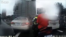 Scooter rider attempts to dodge traffic