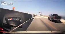 Pick up truck looses control and crashes in road works barrier. VOLUME WARNING