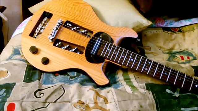 My Headless homemade guitar (after improvements - brass pulleys - )
