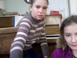 song on piano with megan and lila
