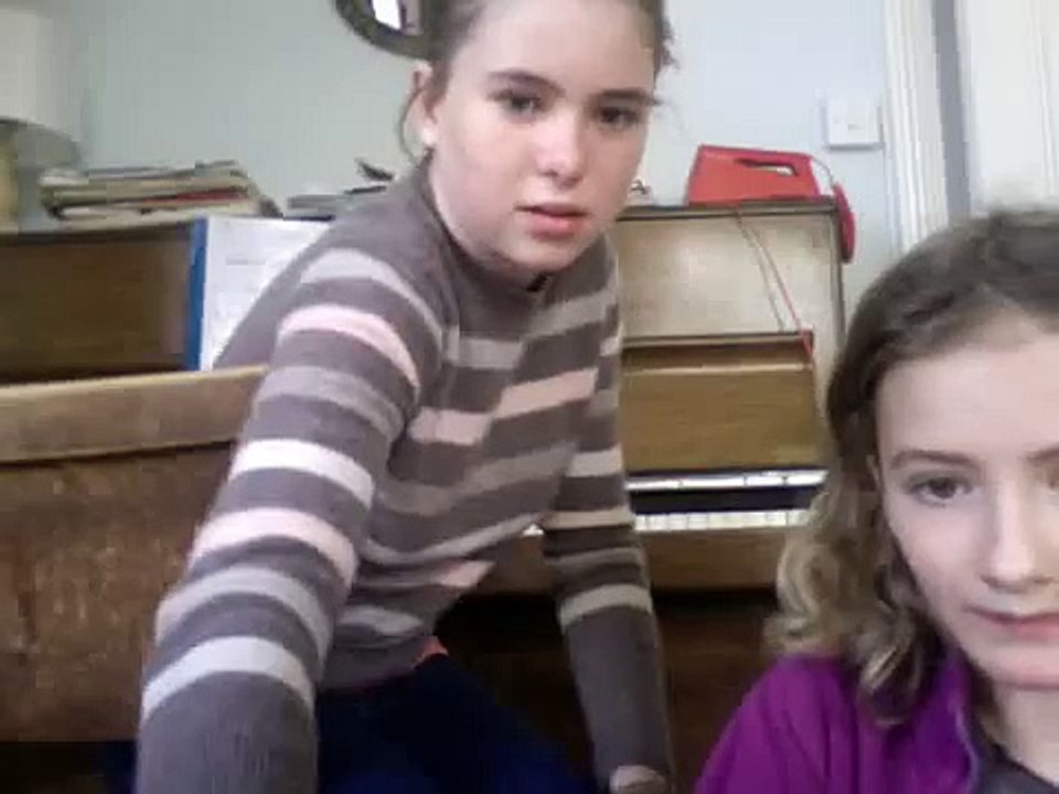 song on piano with megan and lila