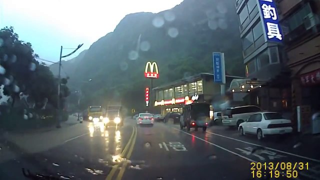 Huge Rock Rolling Down A Hill Hit A Car At Keelung City