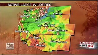 Western wildfires force Americans to change holiday plans - Eight states report large fires