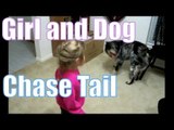 Dog And Little Girl Chasing Their Tails