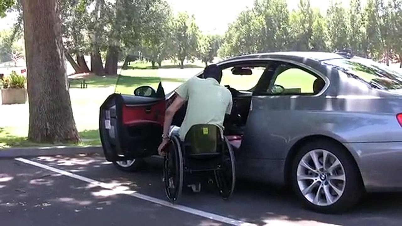 Quadriplegic transfers in and out of two-door BMW with TiLite ZR
