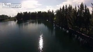 DJI Phantom 2 crashes into tree and lands in Wolf Lake.