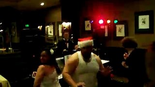 drunk santa pub crawl dancing in wife beater