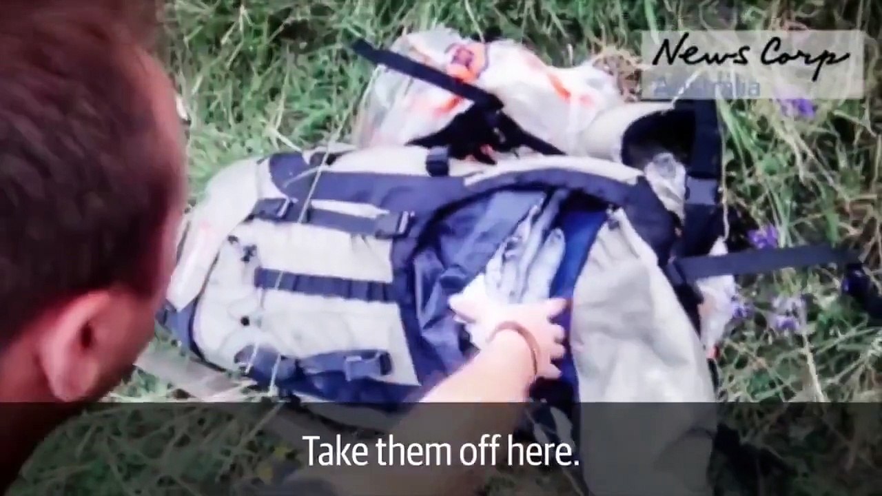 MH17 crash video: shocking footage shows rebels rifling through passenger’s luggage