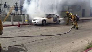 NEW CAR ON FIRE, BODY MIGHT BE INSIDE
