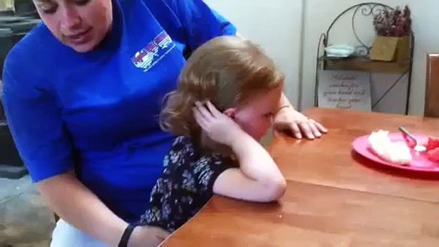 Baby pukes on mom