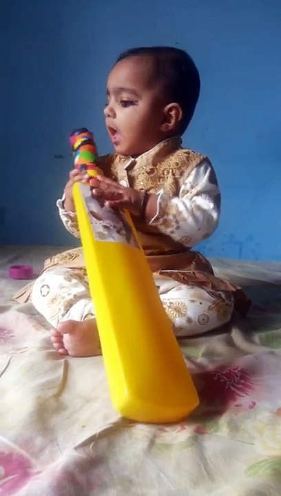 The cute Baby Naina Sagar  playing with Bat