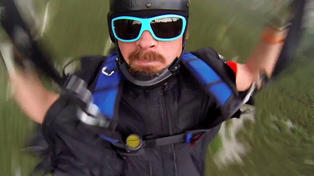 Extreme wing suit flying during thunderstorm