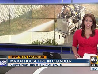 Crews battle house fire in Chandler