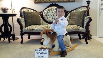 Cute Texas baby-  "Please stop shooting lions"