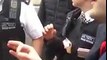 Stop and Search aka Carding: 15-20 Police attempt arrest a man in Croydon, South London - England.