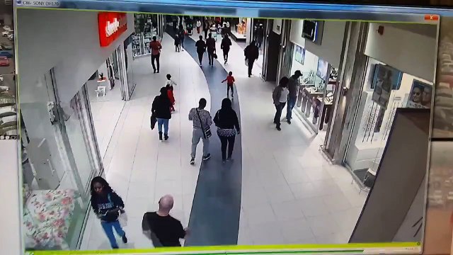 Cell phone thief in mall gets hard tackled.