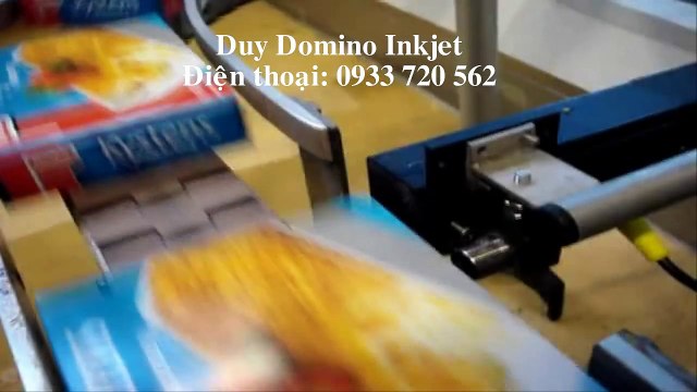 Máy in phun date Domino trên bao bì bánh kẹo