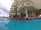 Slade jumping into a swimming pool at Gulf Shores