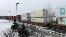 2014.01.26 Large CN Container Trains Meet at Cornwall (148 and 105)