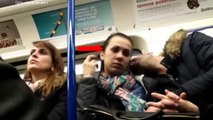 Girls check out guys on train