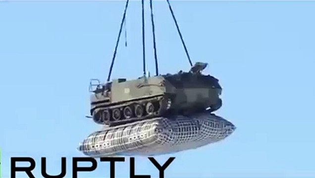 Dropping Russian tank using parachute