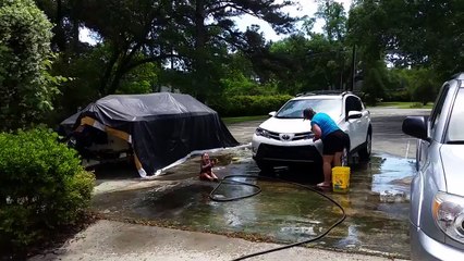 Eli helping Gram wash her car!