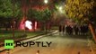 RAW: Fire, stun grenades fly in Athens as riot police clash with protesters