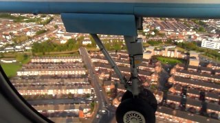 Flybe Dash 8 landing at Belfast City Airport