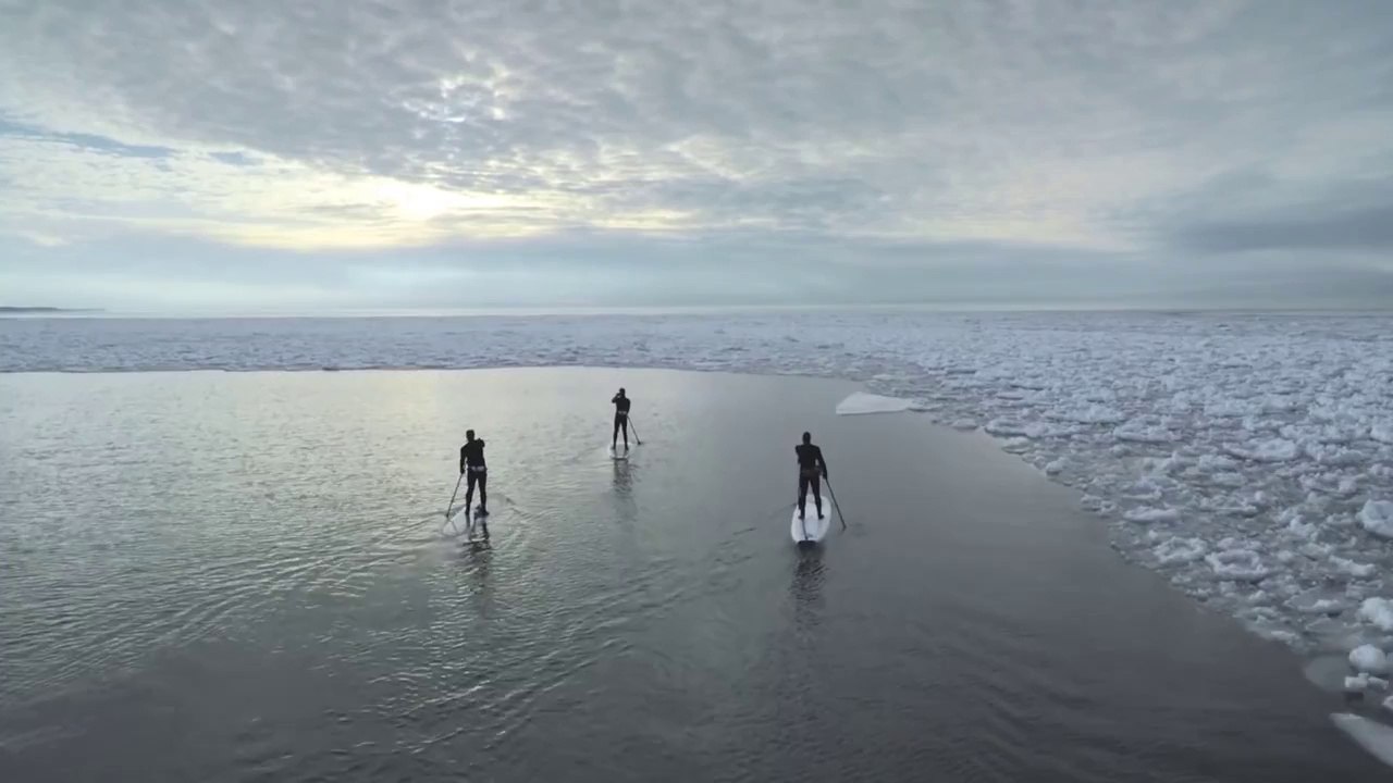 Winter paddle session among icebergs on Lake Michigan