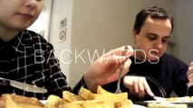weird couple eating fish and chips BACKWARDS