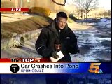 Woman Drives Car into Frozen Pond