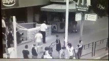 Crazy guy goes on a rampage hitting people, cars, shops and cops in Rishon Lezion, Israel