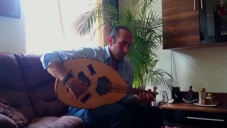 Sherif playing arabic music with oud in Berlin