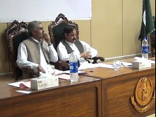Information Minister KPK Mushtaq Ghani distributes shields at UoM