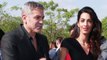 George Clooney Jokes He's the 'Arm Candy' in His Marriage